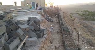 شروع عملیات دیوار کشی صحن امامزاده وآرامستان